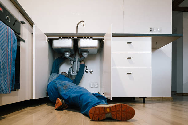 Professional Emergency Plumber technician working in Cabin John, MD